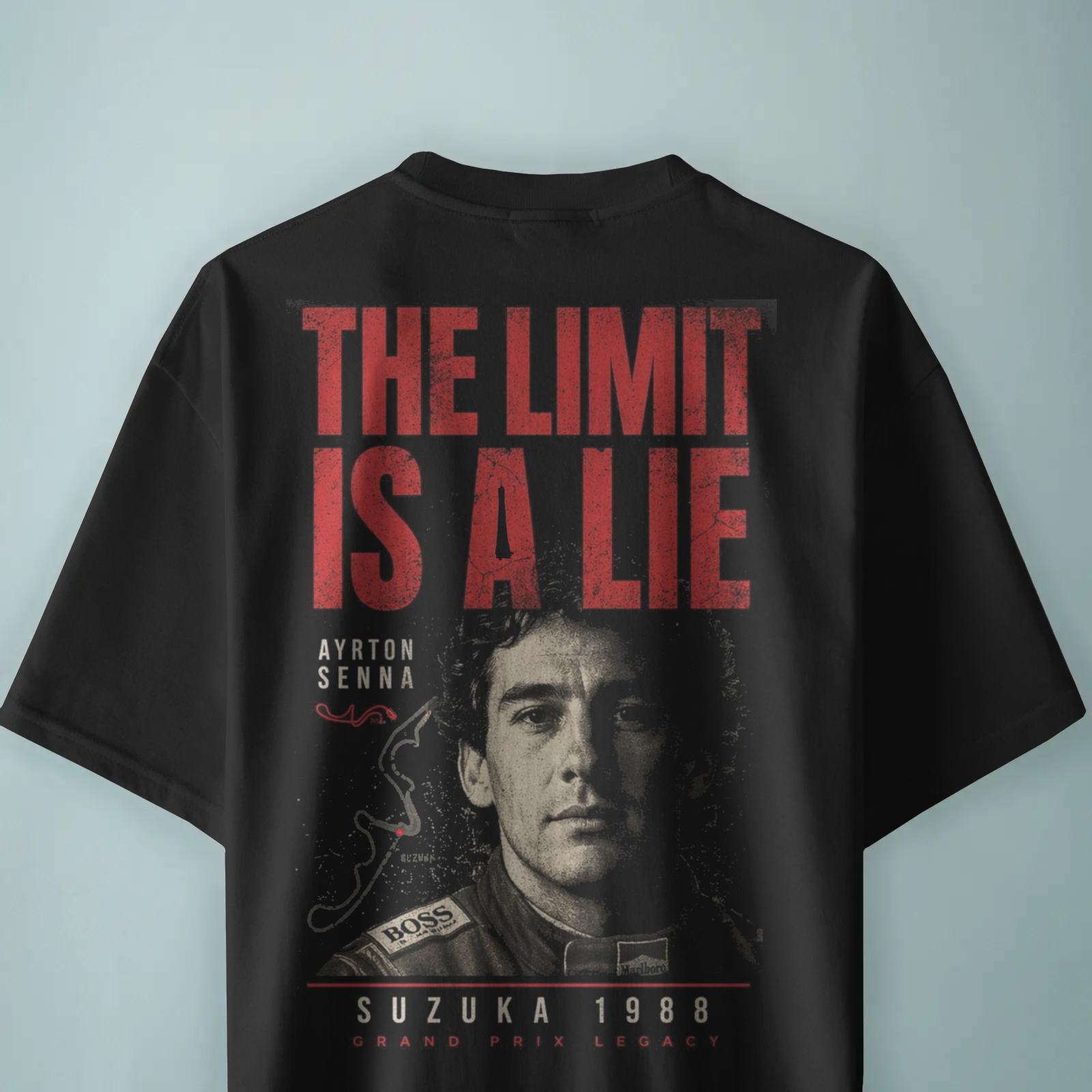 Black t-shirt with red text 'The Limit is a Lie' and a graphic of a person on a light blue background